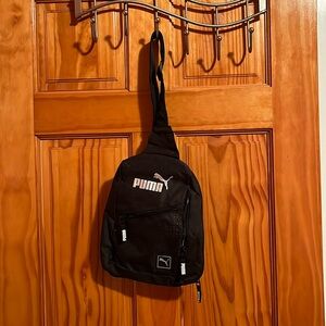 Puma crossbody bag.
3 different compartments